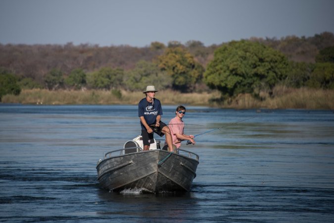 Tyler and Casey fishing on the Upper Zambezi