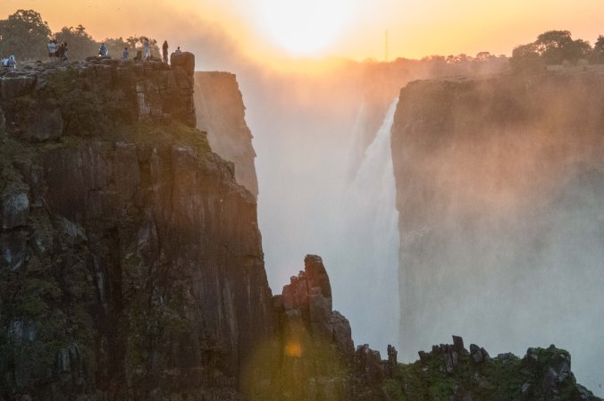 People watching the sunset from teh Zimbabwe side