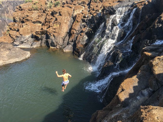 Casey jumping into the Angel Pool above the falls