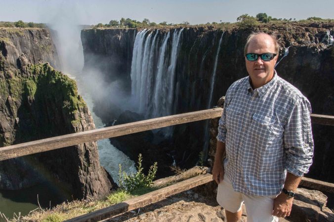 Charlie with Victoria Falls behind him