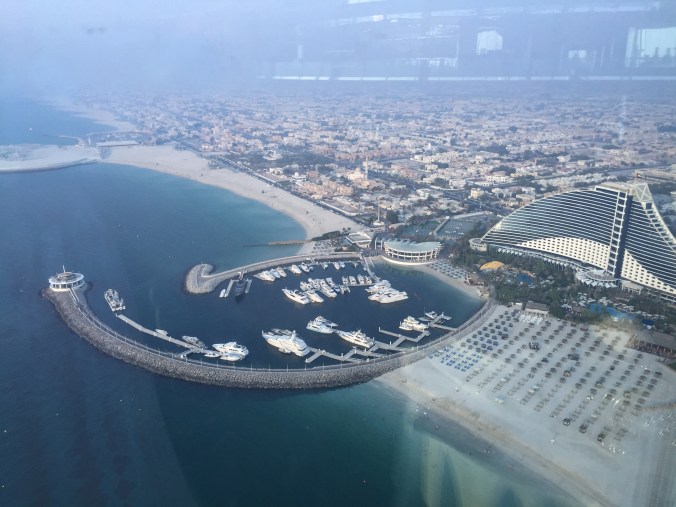 Looking out the window from the Skybar towards the marina (some fancy boats)